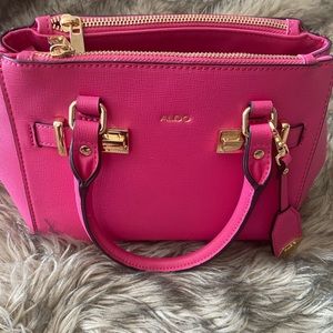 Pink Aldo purse with adjustable cross body strap